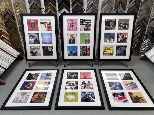 Grid of framed album covers including TLC, Beyonce, and R.E.M.