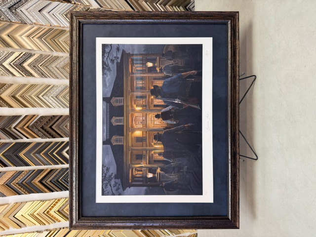 Framed art print with a suede mat and rustic wood frame